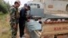 Activists: Syrian Troops Oust Rebels from Southern Town
