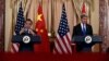 美國國務卿克里（左)和中國外長王毅在美國國務院聯合舉行記者會。