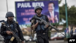 Members of the Cameroonian Gendarmerie patrols in the Omar Bongo Square of Cameroon's majority anglophone South West province capital Buea on October 3, 2018 during a rally in support of Cameroonian President Paul Biya.
