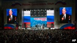 Russian President Vladimir Putin attends a concert in Sevastopol, Crimea, March 14, 2018.