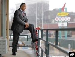 In this Feb. 14, 2018 photo, the Rev. Jesse Jackson stands on the motel balcony where the Rev. Martin Luther King Jr. was assassinated in Memphis, Tenn., April 4, 1968.