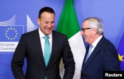 FILE - EU Commission President Jean-Claude Juncker and Irish Prime Minister Leo Varadkar meet in Brussels, Belgium, Feb. 6, 2019.