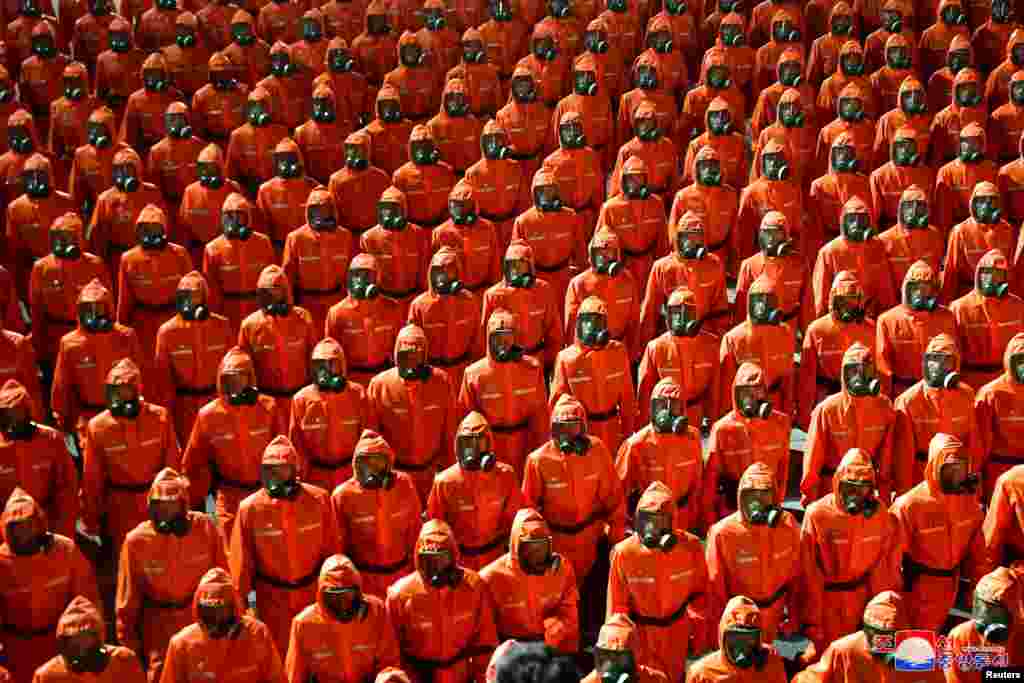 Paramilitary forces parade to mark the 73rd founding anniversary of the republic at Kim Il Sung square in Pyongyang in this undated image supplied by North Korea&#39;s Korean Central News Agency.