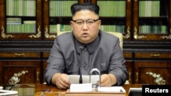 FILE - North Korea's leader Kim Jong Un makes a statement regarding U.S. President Donald Trump's speech at the U.N. general assembly, in this undated photo released by North Korea's Korean Central News Agency in Pyongyang, Sept. 22, 2017.