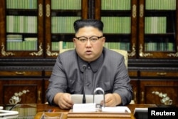 North Korea's leader Kim Jong Un makes a statement regarding U.S. President Donald Trump's speech at the U.N. general assembly, in this undated photo released by North Korea's Korean Central News Agency in Pyongyang, Sept. 22, 2017.
