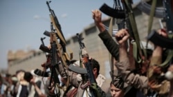 Tribesmen loyal to Houthi rebels hold their weapons as they chant slogans during a gathering aimed at mobilizing more fighters into battlefronts, Sanaa, Sunday, Oct. 2, 2016.