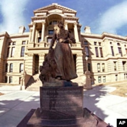 Commanding a prominent position in front of the State Capitol, a statue of Esther Hobart Morris stands outside the capitol building in downtown Cheyenne, Wyoming (File)