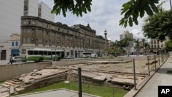 FILE - The ruins of the "Cais do Valongo" or "Valongo wharf," seen in this Nov. 26, 2015 file photo in Rio de Janeiro, Brazil, are now the new addition to UNESCO's list of World Heritage sites.