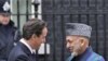 Karzai, Cameron Bahas Transisi Penjagaan Keamanan Afghanistan