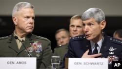 Marine Corps Commandant Gen. James Amos, left, and Air Force Chief of Staff Gen. Norton Schwartz, testify on Capitol Hill in Washington Friday, Dec. 3, 2010, before the Senate Armed Service Committee hearing on the military Don't Ask Don't Tell policy.