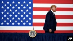 President Donald Trump leaves after participating in a roundtable on donating plasma at the American Red Cross national headquarters on Thursday, July 30, 2020, in Washington. (AP Photo/Evan Vucci)