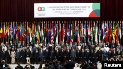 Asian and African leaders pose for photographs during a photo session to mark the 60th Asian-African Conference Commemoration at Gedung Merdeka in Bandung, Indonesia, April 24, 2015.
