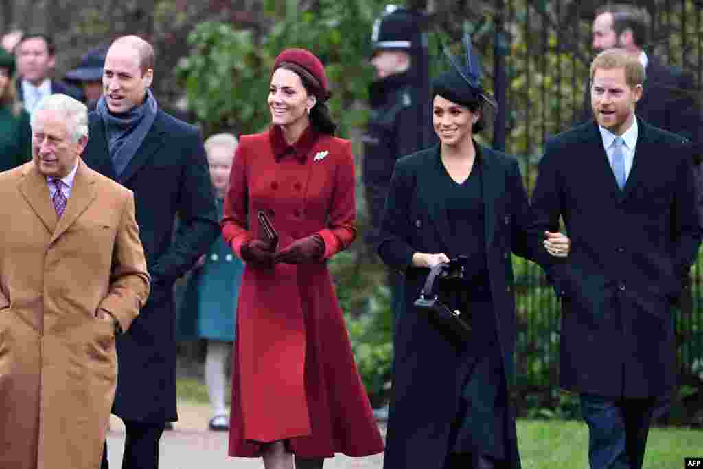 (L-R) Britain's Prince Charles, Prince of Wales, Britain's Prince William, Duke of Cambridge, Britain's Catherine, Duchess of Cambridge, Meghan, Duchess of Sussex and Britain's Prince Harry, Duke of Sussex arrive for the Royal Family's traditional Christmas Day service at St. Mary Magdalene Church in Sandringham, Norfolk, eastern England.