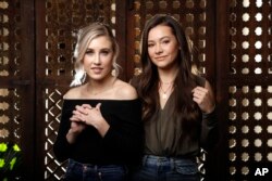 Madison Marlow, left, and Taylor Dye, of the duo Maddie & Tae, pose in Nashville, Tennessee, March 20, 2019.