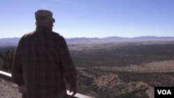 Glenn Spencer's Cochise County, Arizona ranch is roughly a football field away from the rust metal barrier that separates the United States and Mexico. (R. Taylor/VOA)