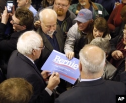 Democratic presidential candidate, Sen. Bernie Sanders, I-Vt. works the crowd after a rally at a local union hall in Janesville, Wis., April 4, 2016.