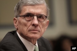 FILE - FCC Chairman Tom Wheeler is shown giving testimony on Capitol Hill, March 17, 2015. Wheeler says the net neutrality ruling ensures the internet will remain "a platform for unparalleled innovation, free expression and economic growth."