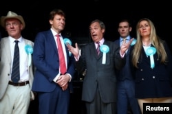 Brexit Party leader Nigel Farage and members of the party attend a Brexit Party campaign event in Essex, Britain, May 16, 2019.