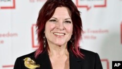 FILE - Rosanne Cash attends the 2018 PEN Literary Gala in New York, May 22, 2018.