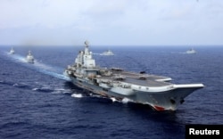 2018年4月18日，中国航母辽宁号参加中国海军在西太平洋的军事演习。