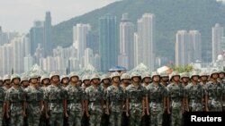 中國駐港軍隊2019年6月30日在香港昂船洲海軍基地舉行軍事表演。