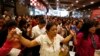 Spouses of Philippine Contract Workers Adjust to Single Fatherhood