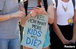 Students who walked out of their Montgomery County, Maryland, schools protest against gun violence in front of the White House in Washington, Feb. 21, 2018.