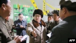 This undated photo released by North Korea's official Korean Central News Agency (KCNA) on April 1, 2016 shows North Korean leader Kim Jong-Un (C) visting the Sinhung Machine Plant in South Hamgyong Province.