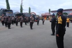 Upacara pelepasan pemberangkatan 48 personel Brimob Polda Sulteng menuju Sulawesi Barat. Jumat (15/1/2021) (Foto: Humas Polda Sulteng)