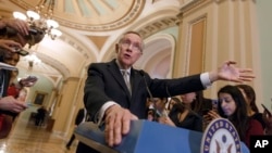 Senate Majority Leader Harry Reid seen here in a March 2014 file photo on Capitol Hill.