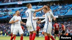 Des joueurs de l'équipe d'Angleterre heureux après un but contre la Turquie, Angleterre le 22 mai 2016