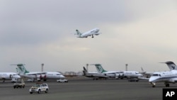 FILE - A Mahan Air passenger plane takes off from Mehrabad Airport in Tehran, Iran, Feb. 7, 2016. Germany has banned Mahan Air, Jan. 21, 2019, from landing in the country with immediate effect, citing security concerns and the airline's involvement in Syria, officials said.