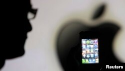 FILE - Apple rejected the government's request to create new software that would allow law enforcement officials to hack into a killer’s iPhone.