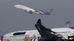 Aeroport International de Bangkok, Thailand, Sept. 9, 2013. (AP Photo/Apichart Weerawong).