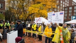 Pro-Thai democracy protesters and Thai royalists face each other during the demonstration at King Bhumibol Adulyadej Square in Cambridge, MA Nov 1, 2020.