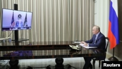 Russian President Vladimir Putin holds talks with U.S. President Joe Biden via a video link in Sochi, Russia, Dec. 7, 2021. 