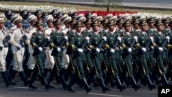 A contingent of the Chinese People's Liberation Army march during a military parade to mark Pakistan's Republic Day, in Islamabad, March 23, 2017.