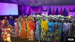 Chibok girls entertain guests during their send-forth dinner at A Class garden in Abuja, Nigeria. The girls will commence a special foundation program at American University of Nigeria Yola . 