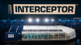 he Interceptor, a new garbage-collecting floating device is moored at a dock in Rotterdam, Netherlands, Saturday, Oct. 26, 2019.