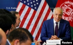 U.S. special envoy for peace in Afghanistan, Zalmay Khalilzad, talks with local reporters at the U.S. embassy in Kabul, Afghanistan, Nov. 18, 2018. (U.S Embassy handout via Reuters)