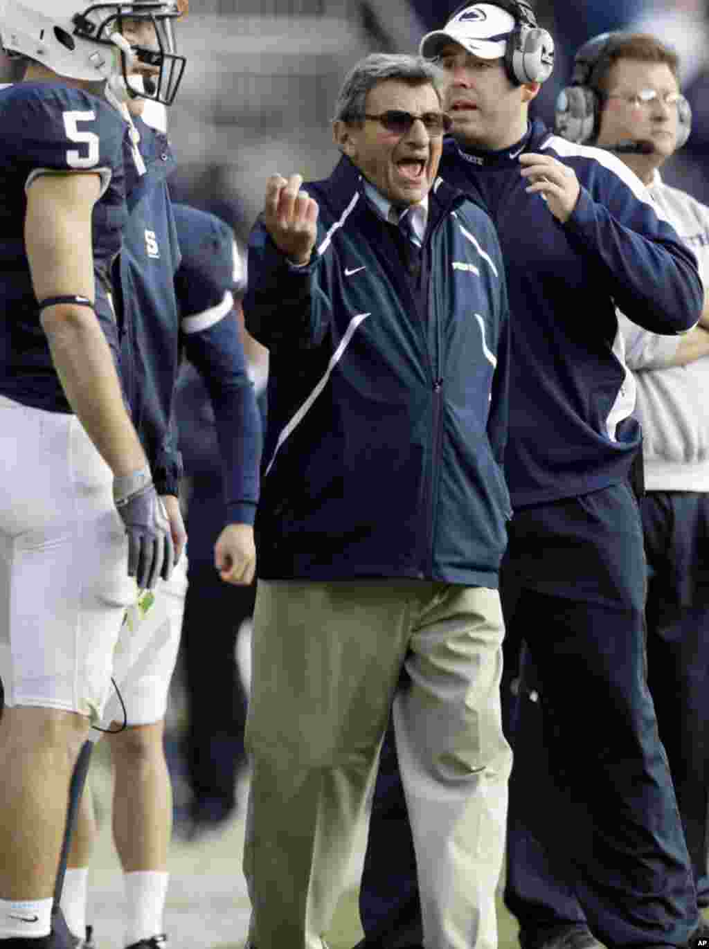 Penn State coach Joe Paterno Yells at officials from the sideline during the second half of an NCAA college football game against Indiana in State College, Pa. Penn State won 31-20, November 14, 2009. (AP)