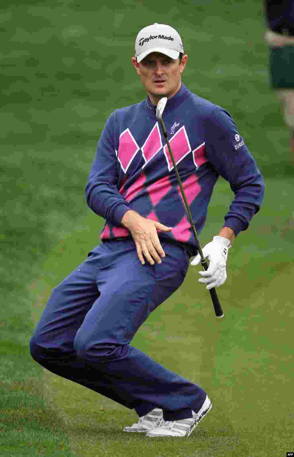 Justin Rose of England chips in for eagle on the 15th during the second round of the Wells Fargo Championship at the Quail Hollow Club in Charlotte, North Carolina.