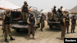 FILE - Pakistani soldiers are seen in the country's Khyber tribal region.