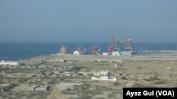 Pakistan's newly-built cargo port of Gwadar under construction is jointly developed by Chinese and Pakistani engineers.
