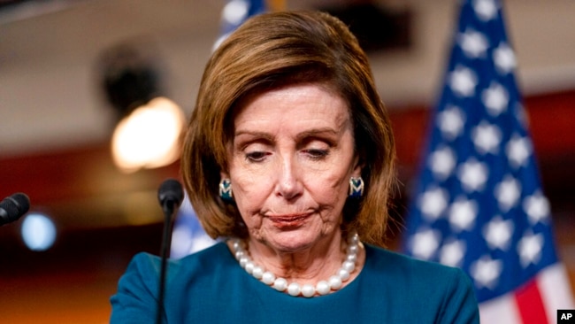 US House Speaker Nancy Pelosi of Calif., listens to a question from a reporter during a news conference on Capitol Hill in Washington, Oct. 28, 2021.