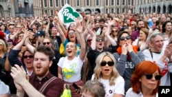 People from the "Yes" campaign react as the results of the Irish referendum on the 8th Amendment of the Irish Constitution are received, at Dublin Castle, in Dublin, May 26, 2018.
