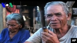 An elderly couple, one of the minority villagers, living in Ratanakirri, are also caught up in a land dispute with the sister of Cambodia’s Finance Minister, Keat Chhon, file photo. 