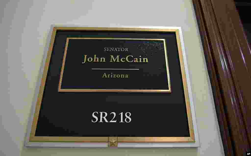 The sign marking the office of Sen. John McCain is seen on Capitol Hill in Washington, Aug. 26, 2018. 
