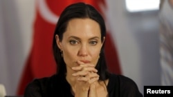 FILE - United Nations High Commissioner for Refugees (UNHCR) Special Envoy Angelina Jolie attends a news conference.