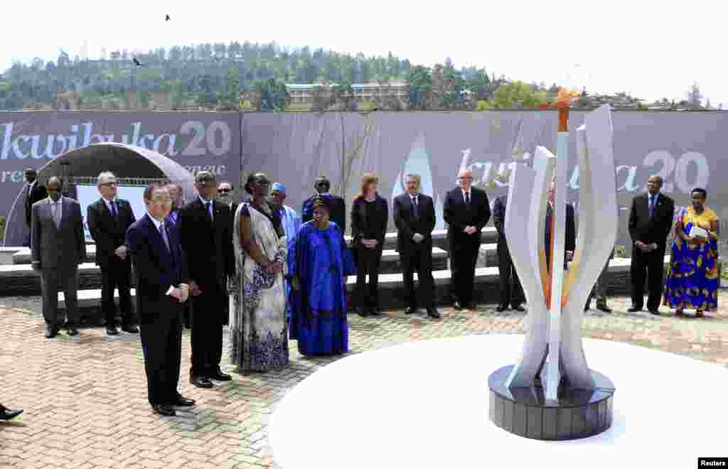 U.N. Secretary General Ban Ki-moon, Rwandan President Paul Kagame, Jeannette Kagame and AU Commission Chairwoman Nkosazana Dlamini-Zuma participate in the commemoration of the 20th anniversary of the genocide in Kigali, April 7, 2014.